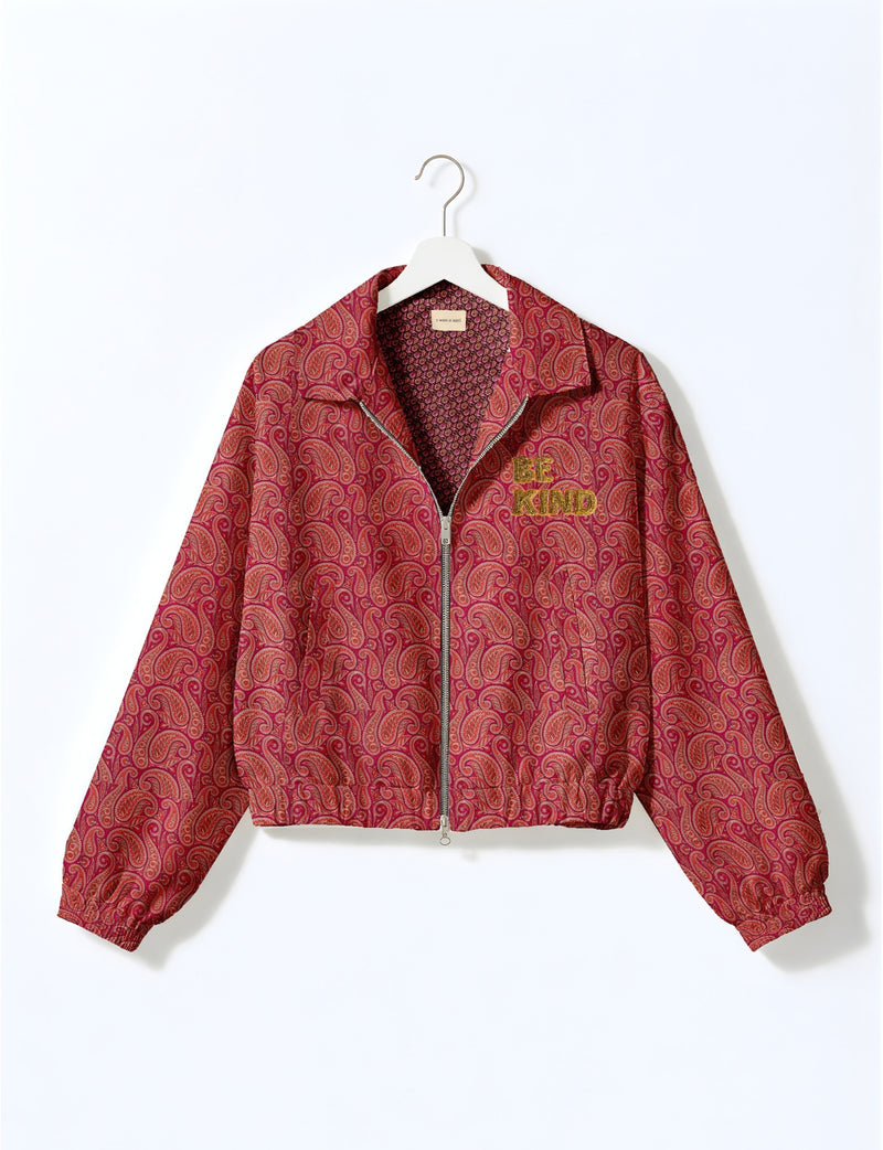 BE KIND Bomber jacket made from upcycled sari fabric with handcrafted Aari embroidery by female artisans.