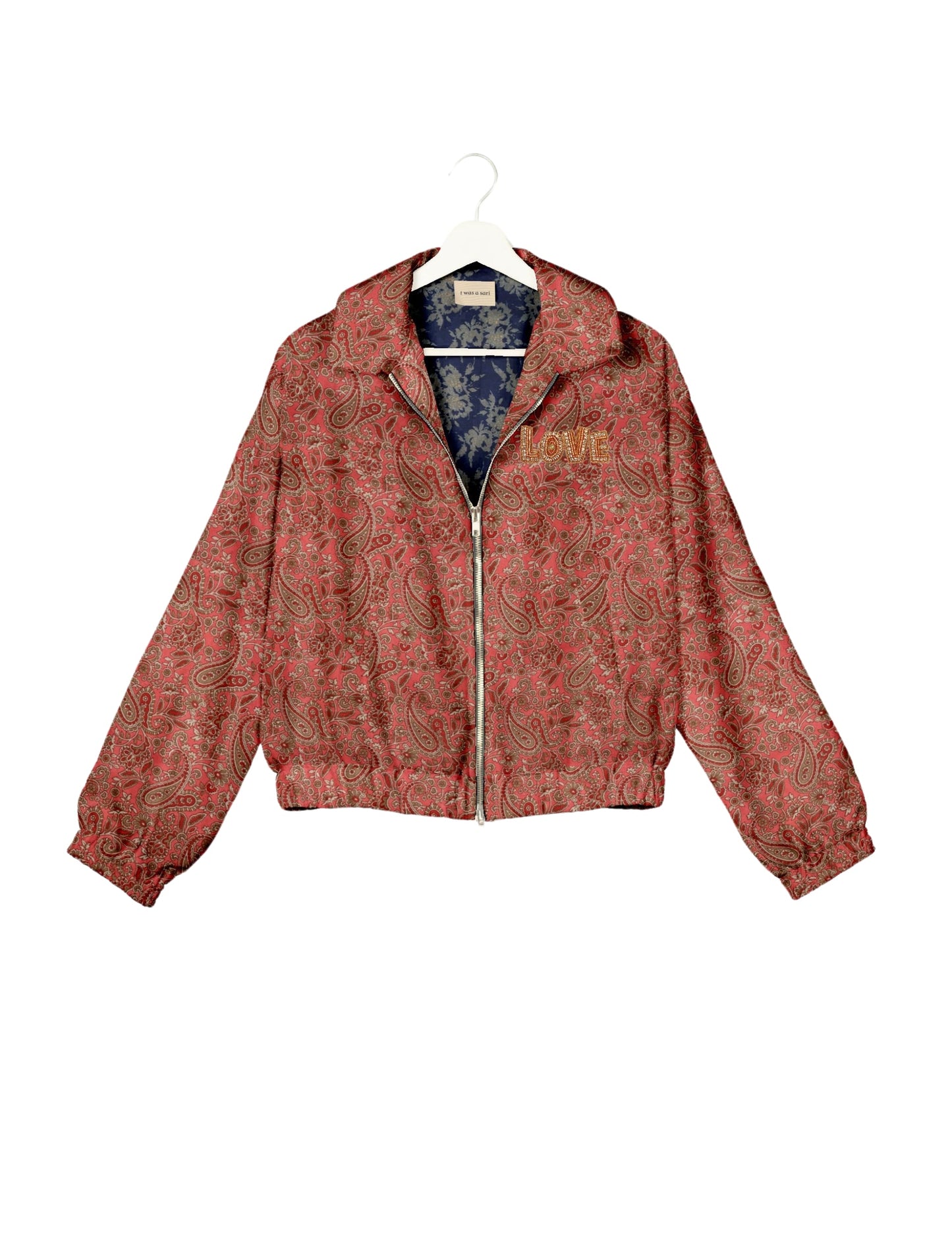 Love Bomber Jacket made from recycled fabric, featuring hand-stitched Aari embroidery. A unique piece of zero-waste clothing, part of the circular fashion movement. Designed with upcycled materials for a stylish yet environmentally friendly clothing choice.