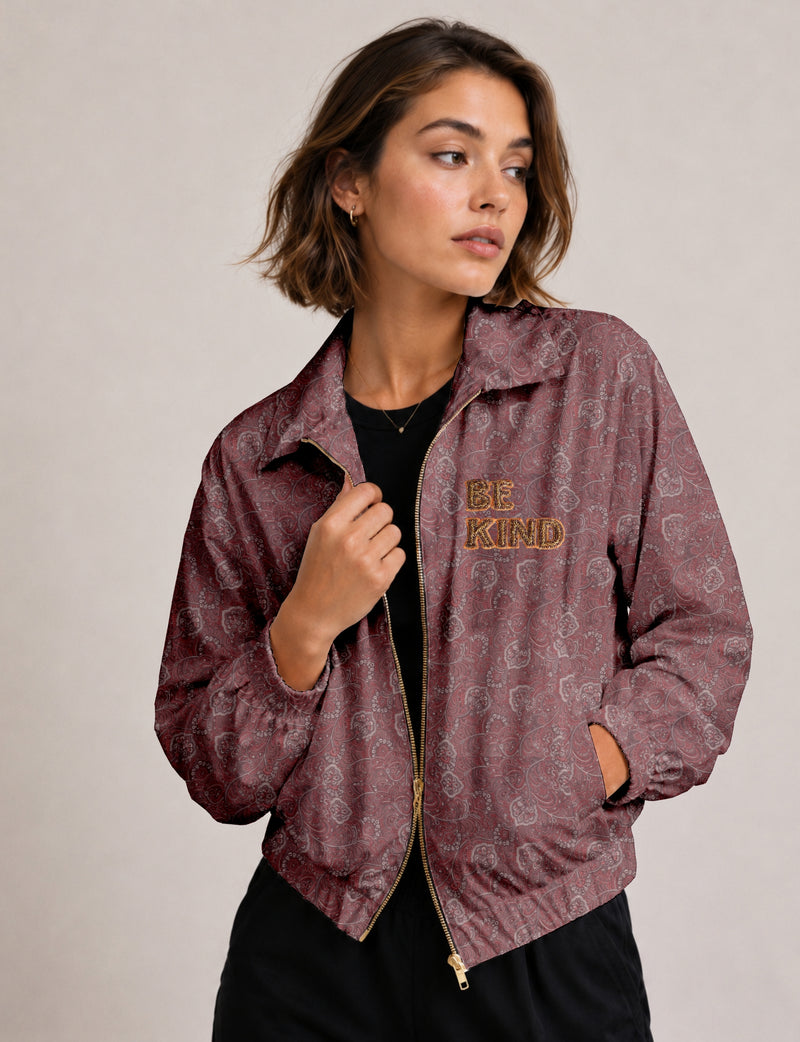 BE KIND Bomber jacket made from upcycled sari fabric with handcrafted Aari embroidery by female artisans.