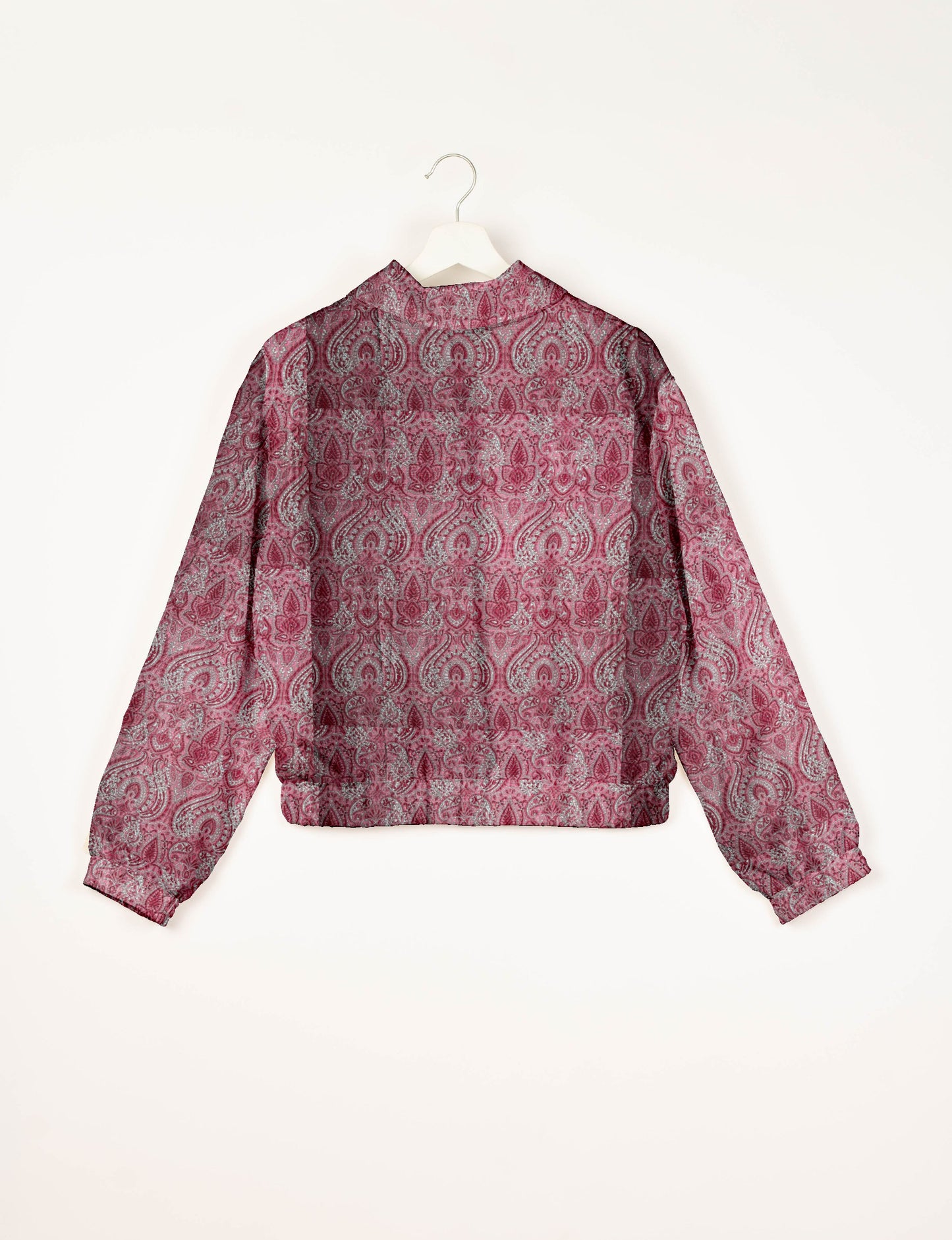 Upcycled Bomber Jacket made from recycled sari materials, featuring a cute cropped shape, elasticated hem and cuffs, and contrast sari print lining. Sustainable apparel promoting eco-friendly fashion and ethical clothing.