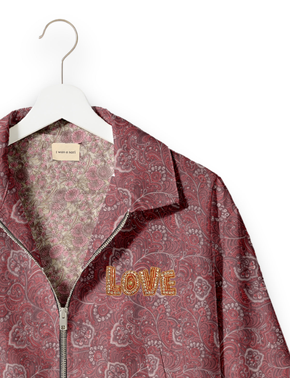 Love Bomber Jacket made from recycled fabric, featuring hand-stitched Aari embroidery. A unique piece of zero-waste clothing, part of the circular fashion movement. Designed with upcycled materials for a stylish yet environmentally friendly clothing choice.