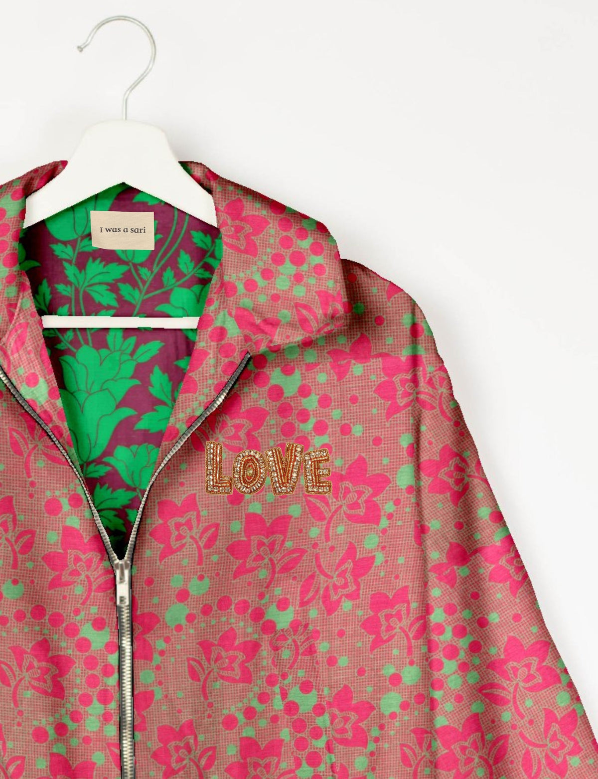 Love Bomber Jacket made from recycled fabric, featuring hand-stitched Aari embroidery. A unique piece of zero-waste clothing, part of the circular fashion movement. Designed with upcycled materials for a stylish yet environmentally friendly clothing choice.