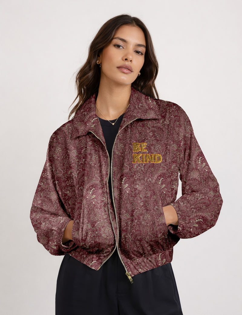 BE KIND Bomber jacket made from upcycled sari fabric with handcrafted Aari embroidery by female artisans.
