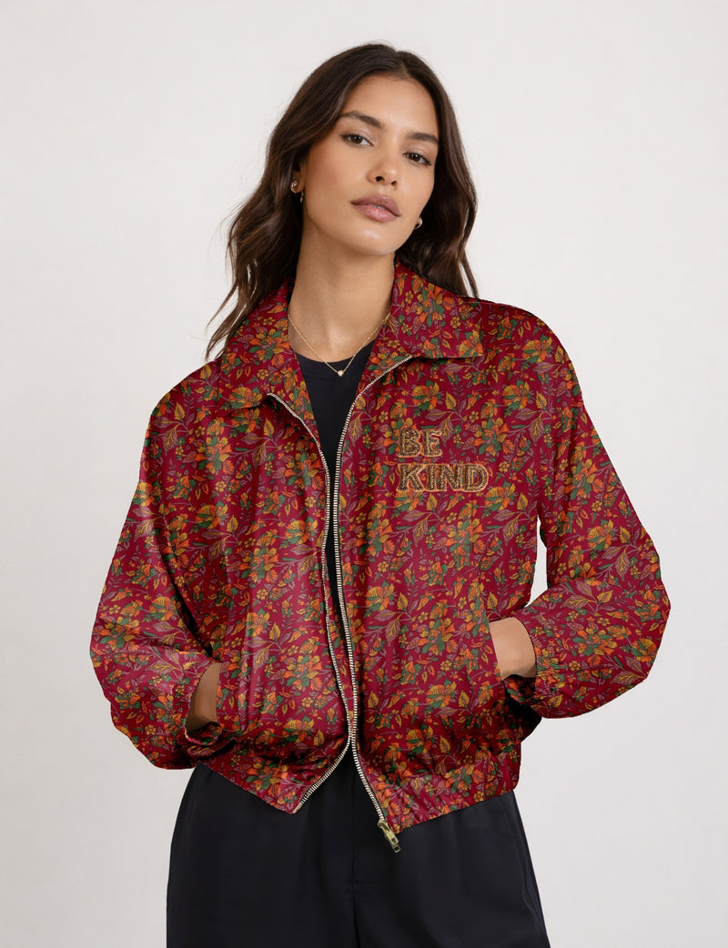 BE KIND Bomber jacket made from upcycled sari fabric with handcrafted Aari embroidery by female artisans.
