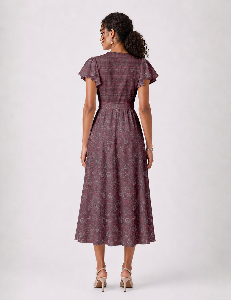 Elegant midi wrap dress with a V-neckline, adjustable waist tie, fitted bodice, and flared skirt for a timeless, flattering silhouette.