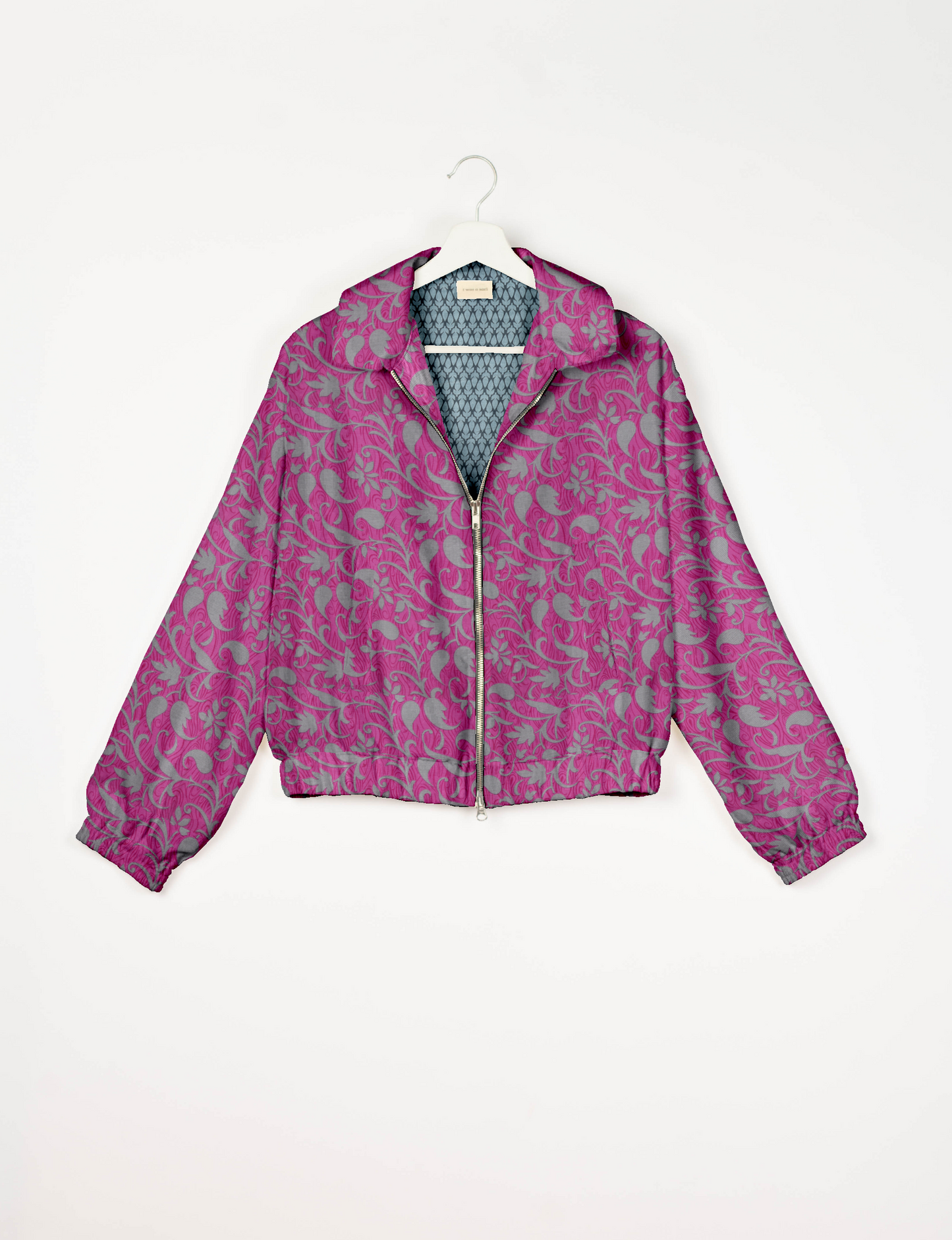 Upcycled Bomber Jacket made from recycled sari materials, featuring a cute cropped shape, elasticated hem and cuffs, and contrast sari print lining. Sustainable apparel promoting eco-friendly fashion and ethical clothing.
