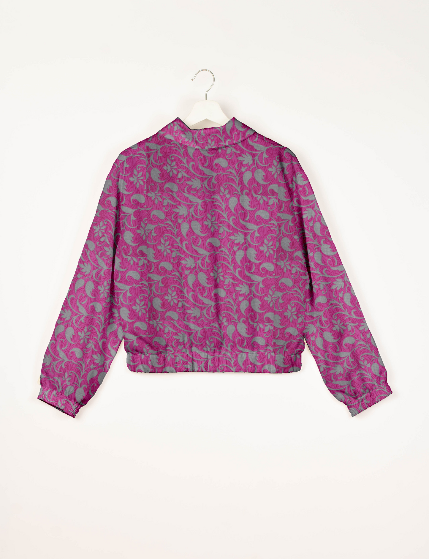 Upcycled Bomber Jacket made from recycled sari materials, featuring a cute cropped shape, elasticated hem and cuffs, and contrast sari print lining. Sustainable apparel promoting eco-friendly fashion and ethical clothing.
