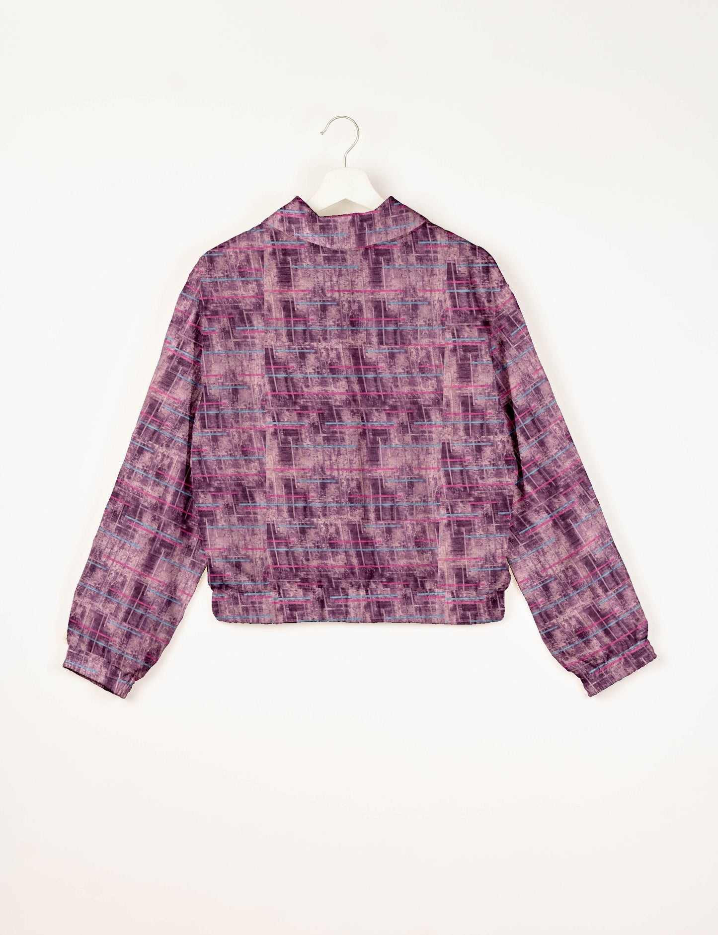 Stylish BOMBER JACKET, an upcycled clothing masterpiece with a cute cropped shape, elasticated details, and detachable metallic zipper. Contrast sari print lining adds a unique touch. Explore sustainable and eco-friendly fashion.