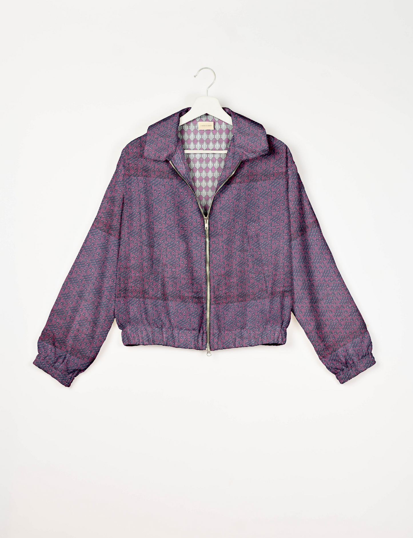 Upcycled Bomber Jacket made from recycled sari materials, featuring a cute cropped shape, elasticated hem and cuffs, and contrast sari print lining. Sustainable apparel promoting eco-friendly fashion and ethical clothing.