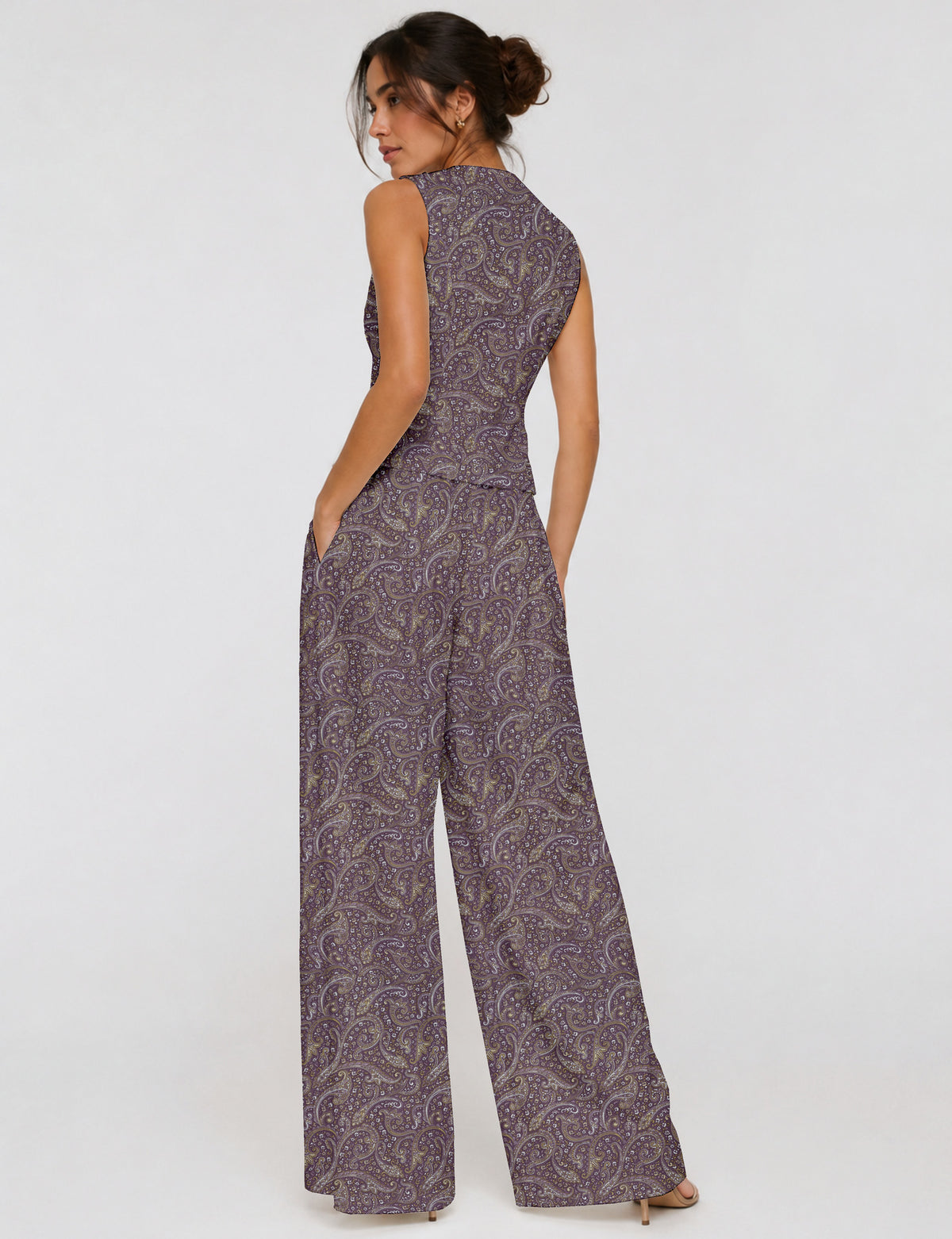 Women's tailored waistcoat set with a sleeveless V-neck button-front waistcoat and high-rise wide leg trousers in a coordinated matching outfit.