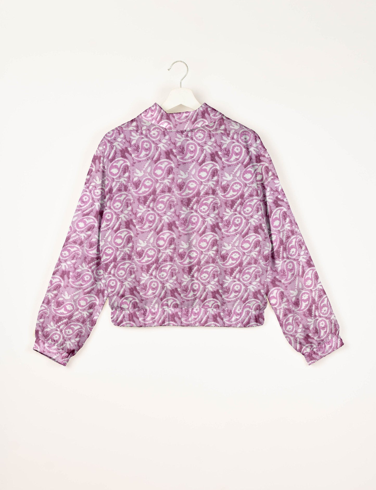 Upcycled Bomber Jacket made from recycled sari materials, featuring a cute cropped shape, elasticated hem and cuffs, and contrast sari print lining. Sustainable apparel promoting eco-friendly fashion and ethical clothing.