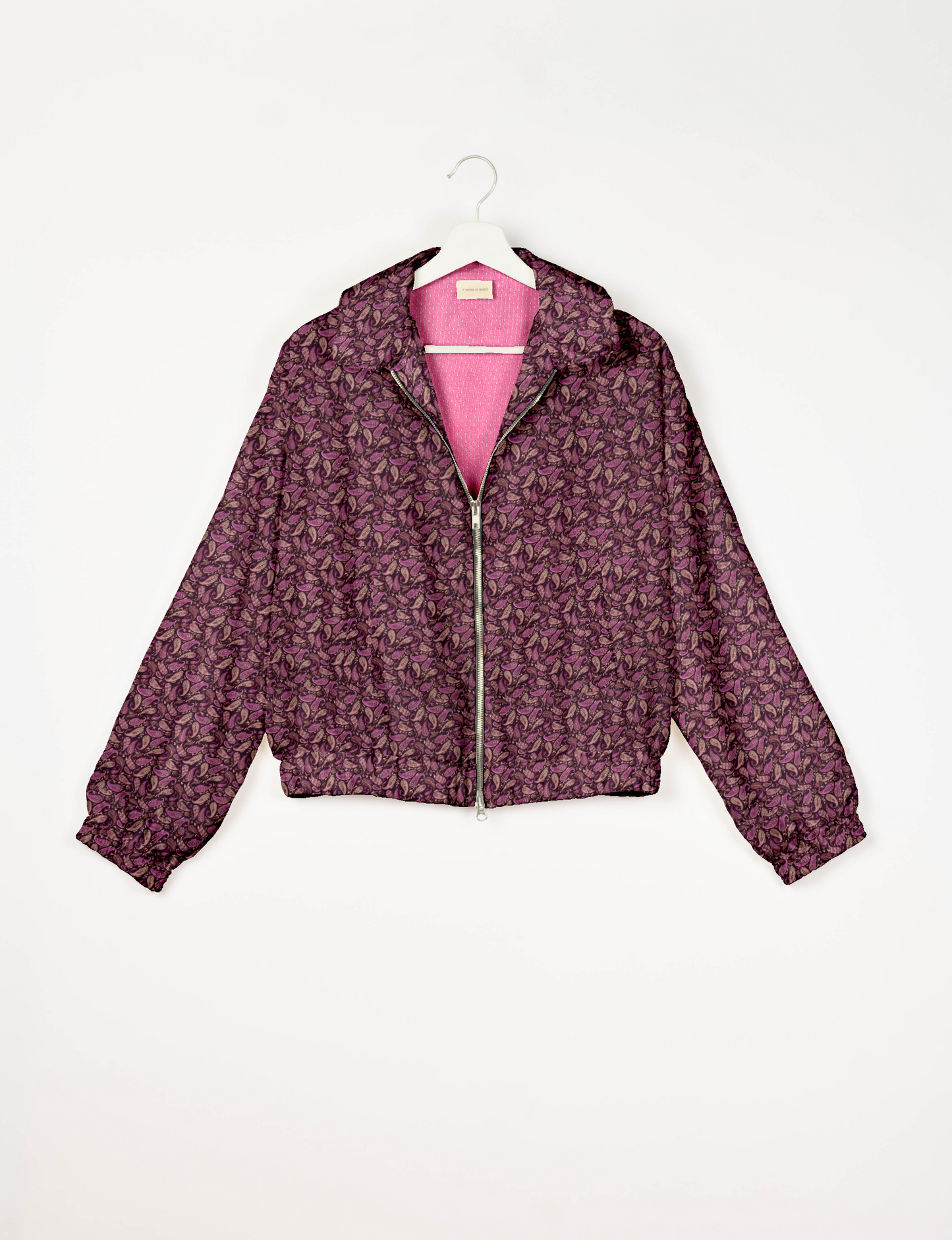 Upcycled Bomber Jacket made from recycled sari materials, featuring a cute cropped shape, elasticated hem and cuffs, and contrast sari print lining. Sustainable apparel promoting eco-friendly fashion and ethical clothing.