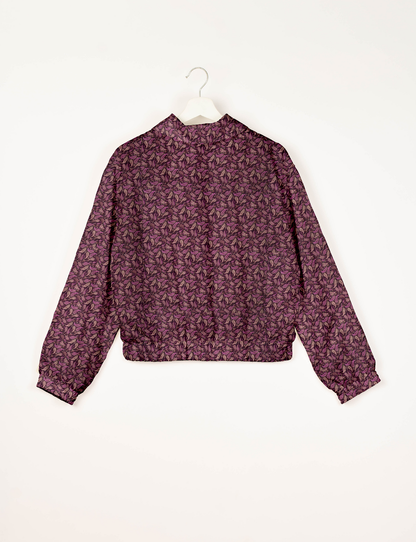 Upcycled Bomber Jacket made from recycled sari materials, featuring a cute cropped shape, elasticated hem and cuffs, and contrast sari print lining. Sustainable apparel promoting eco-friendly fashion and ethical clothing.