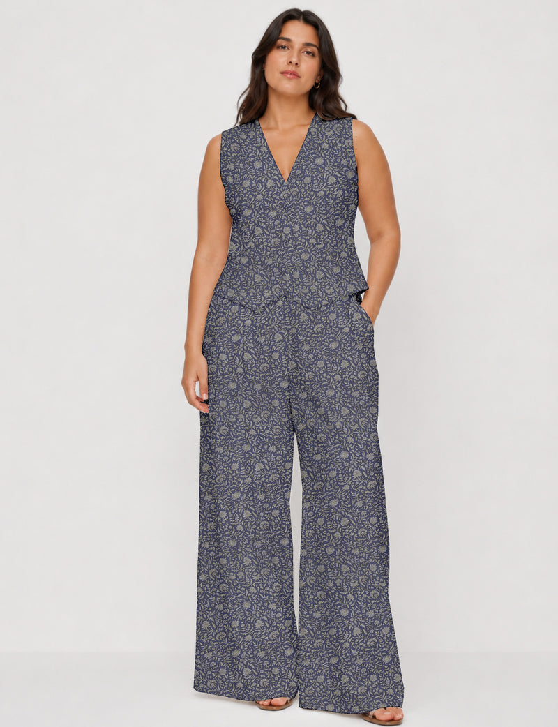 Women's tailored waistcoat set with a sleeveless V-neck button-front waistcoat and high-rise wide leg trousers in a coordinated matching outfit.