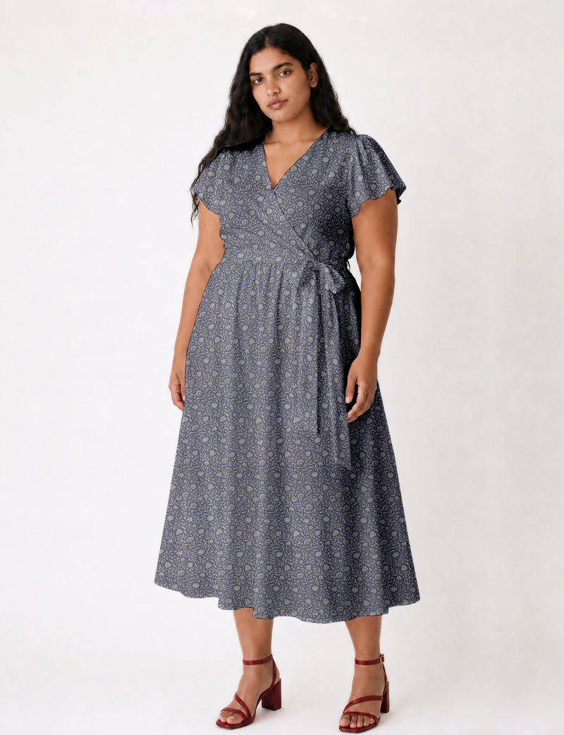 Elegant midi wrap dress with a V-neckline, adjustable waist tie, fitted bodice, and flared skirt for a timeless, flattering silhouette.
