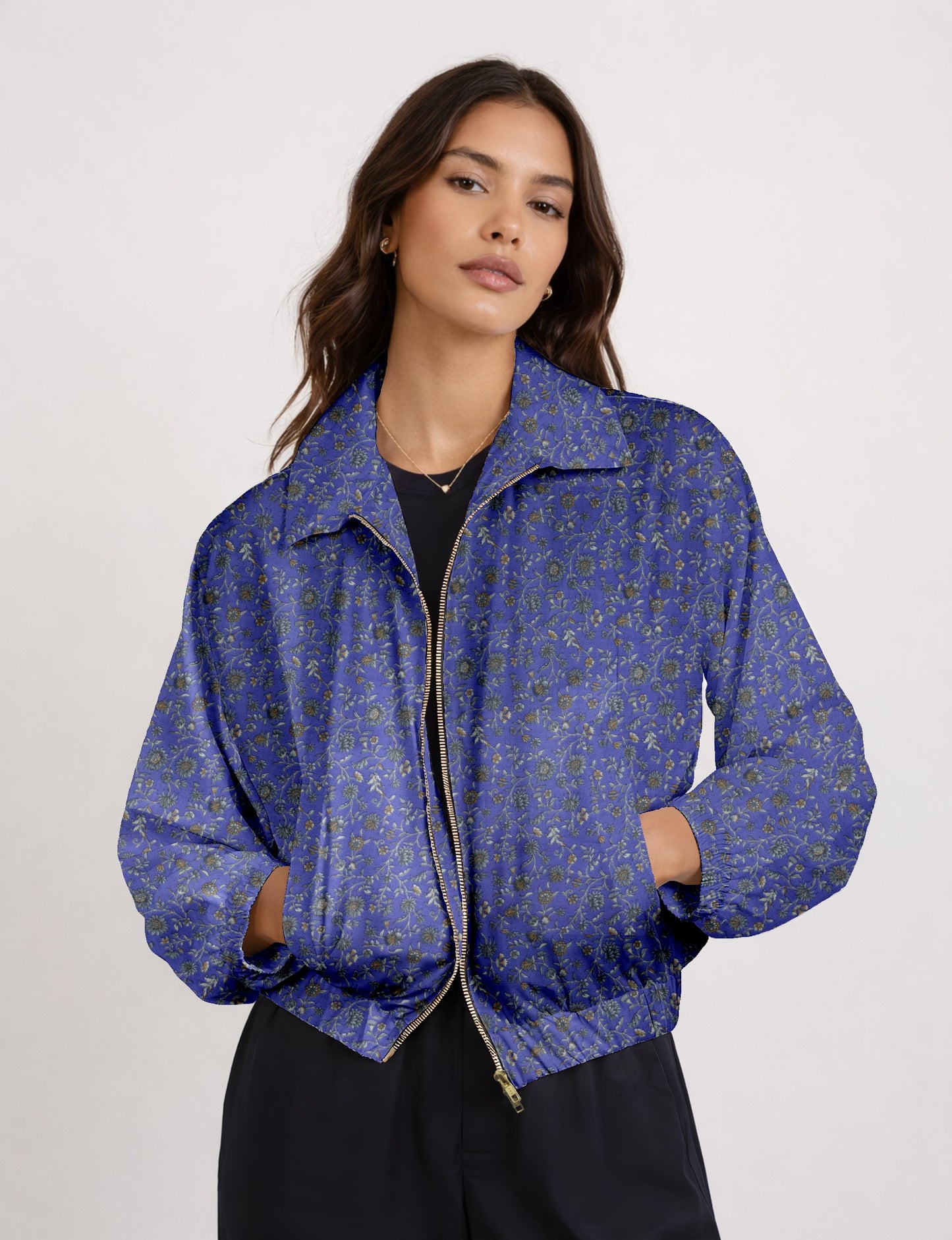 Upcycled Bomber Jacket made from recycled sari materials, featuring a cute cropped shape, elasticated hem and cuffs, and contrast sari print lining. Sustainable apparel promoting eco-friendly fashion and ethical clothing.