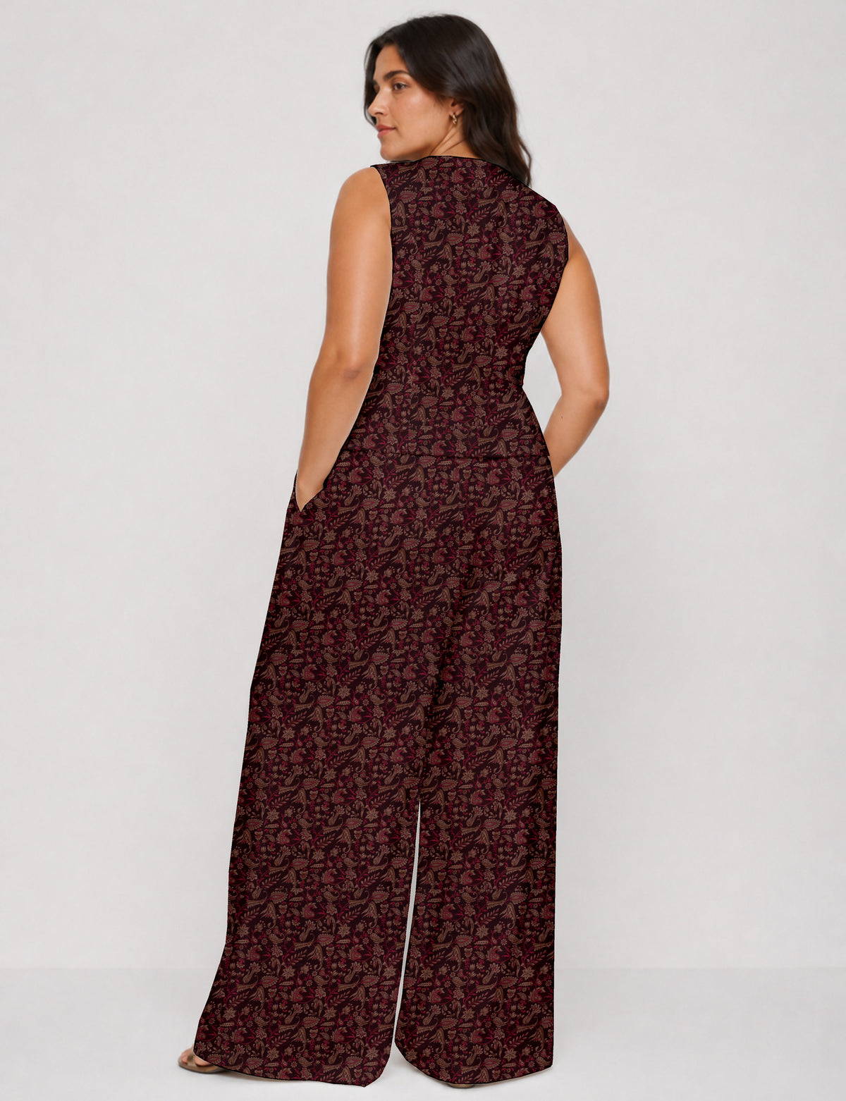 Women's tailored waistcoat set with a sleeveless V-neck button-front waistcoat and high-rise wide leg trousers in a coordinated matching outfit.