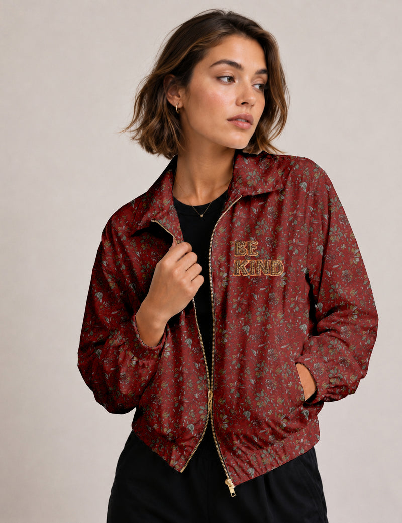 BE KIND Bomber jacket made from upcycled sari fabric with handcrafted Aari embroidery by female artisans.