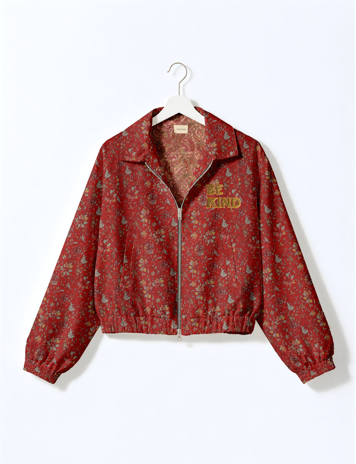BE KIND Bomber jacket made from upcycled sari fabric with handcrafted Aari embroidery by female artisans.