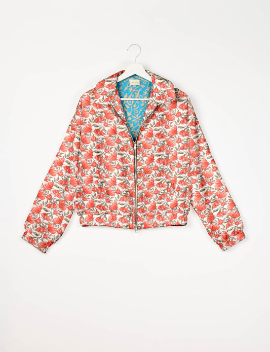 Stylish BOMBER JACKET, an upcycled clothing masterpiece with a cute cropped shape, elasticated details, and detachable metallic zipper. Contrast sari print lining adds a unique touch. Explore sustainable and eco-friendly fashion.