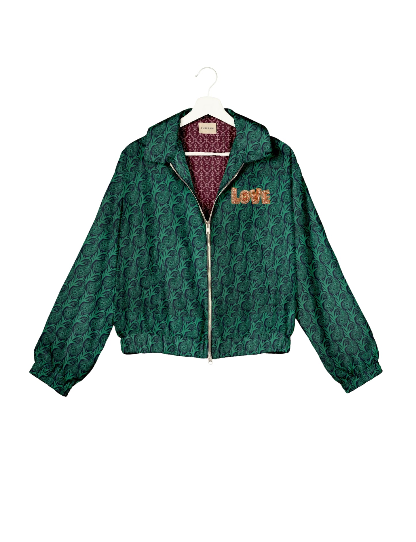 Love Bomber Jacket made from recycled fabric, featuring hand-stitched Aari embroidery. A unique piece of zero-waste clothing, part of the circular fashion movement. Designed with upcycled materials for a stylish yet environmentally friendly clothing choice.
