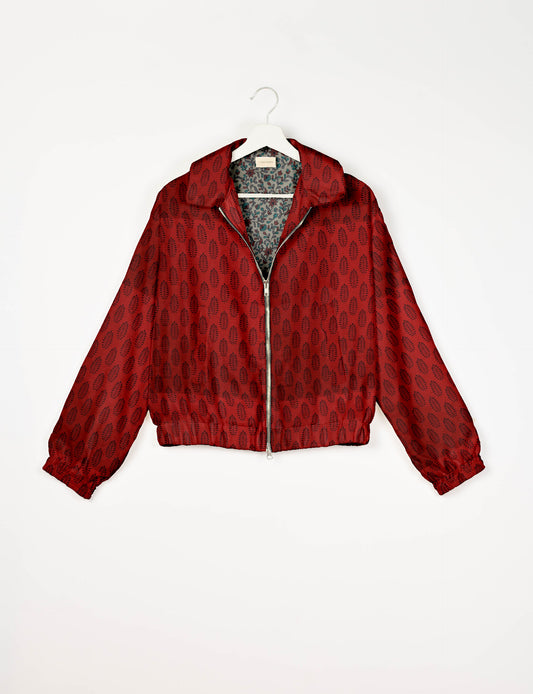 Upcycled Bomber Jacket made from recycled sari materials, featuring a cute cropped shape, elasticated hem and cuffs, and contrast sari print lining. Sustainable apparel promoting eco-friendly fashion and ethical clothing.