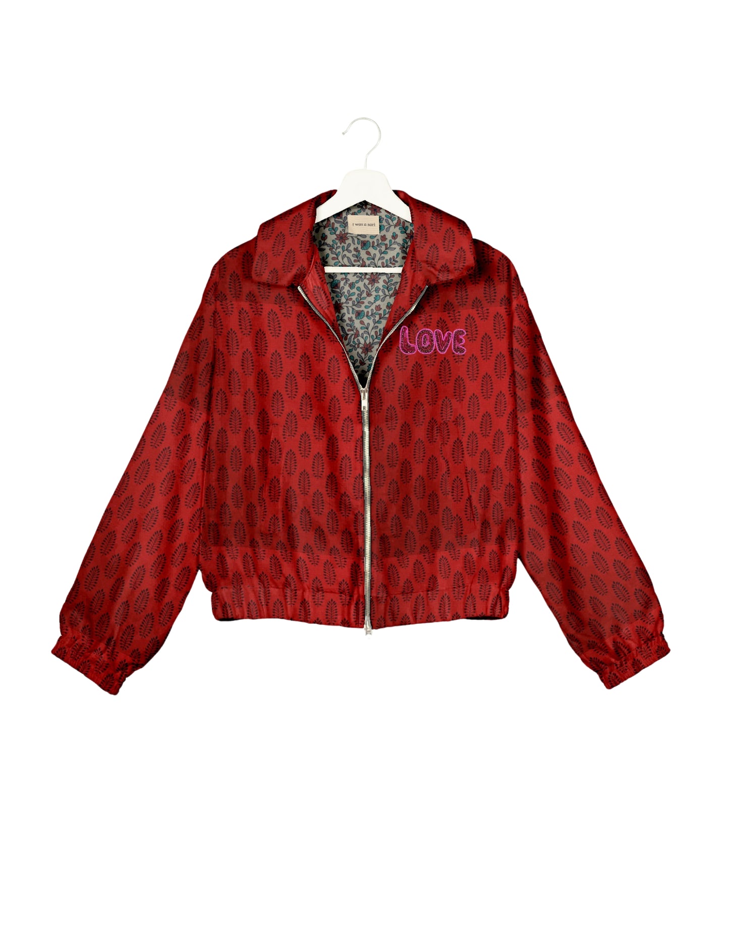 Love Bomber Jacket made from recycled fabric, featuring hand-stitched Aari embroidery. A unique piece of zero-waste clothing, part of the circular fashion movement. Designed with upcycled materials for a stylish yet environmentally friendly clothing choice.