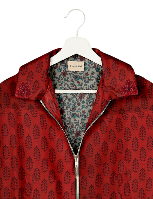 Make a bold statement with our Heart Drop Earrings, a symbol of conscious luxury and ethical fashion. Handcrafted using the intricate Aari embroidery technique, these earrings are made from upcycled sari fabric, embracing slow fashion and zero waste clothing. Elevate your look with sustainable apparel that supports fair trade fashion while reducing textile waste. Choose eco-friendly fashion that speaks of love, artistry, and responsibility.