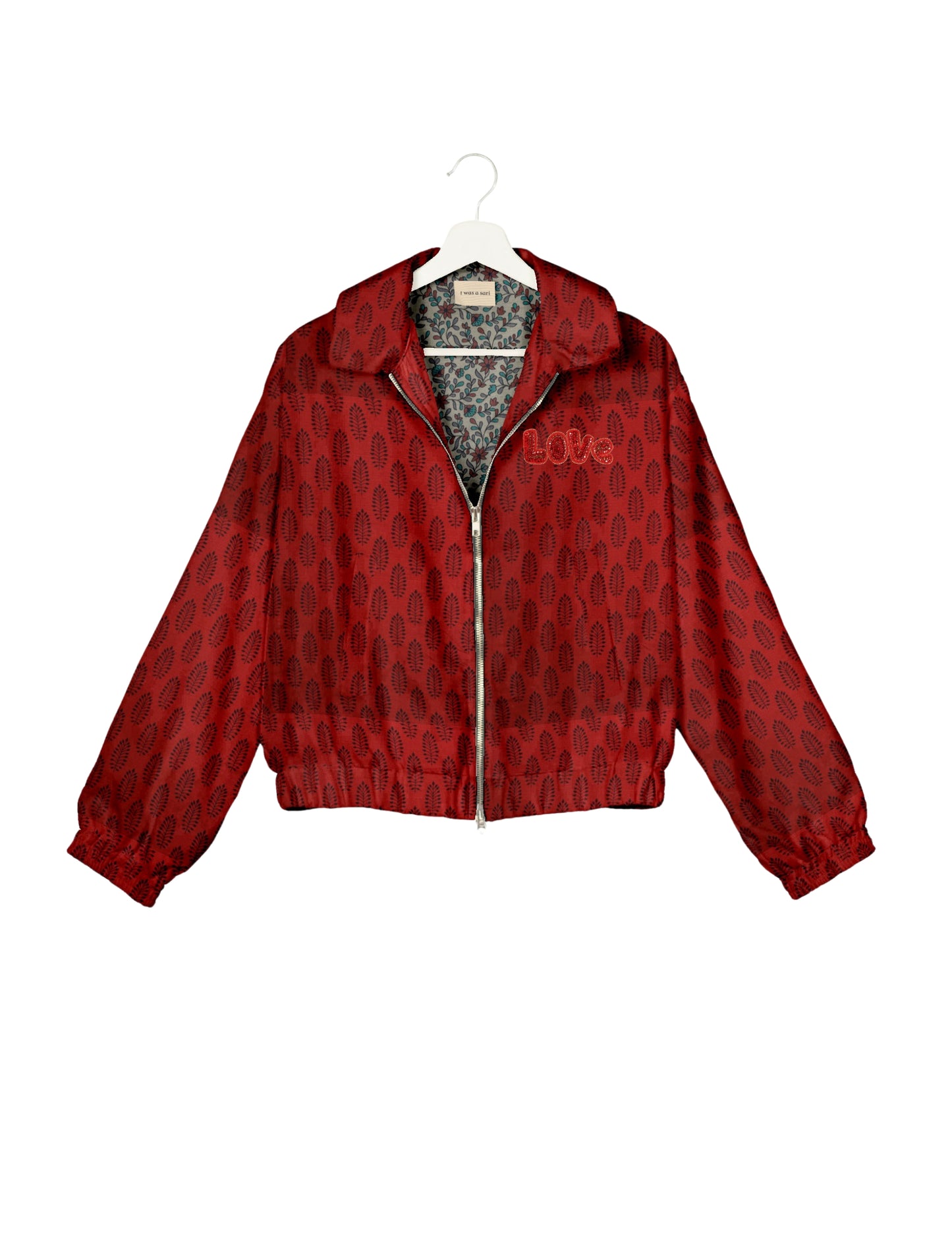 Love Bomber Jacket made from recycled fabric, featuring hand-stitched Aari embroidery. A unique piece of zero-waste clothing, part of the circular fashion movement. Designed with upcycled materials for a stylish yet environmentally friendly clothing choice.