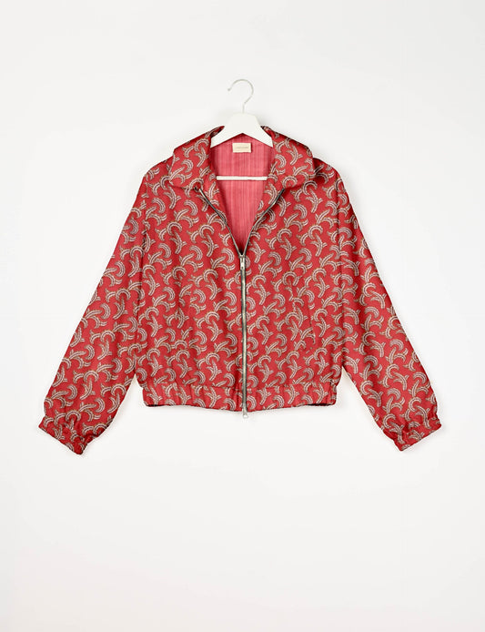 Stylish BOMBER JACKET, an upcycled clothing masterpiece with a cute cropped shape, elasticated details, and detachable metallic zipper. Contrast sari print lining adds a unique touch. Explore sustainable and eco-friendly fashion.