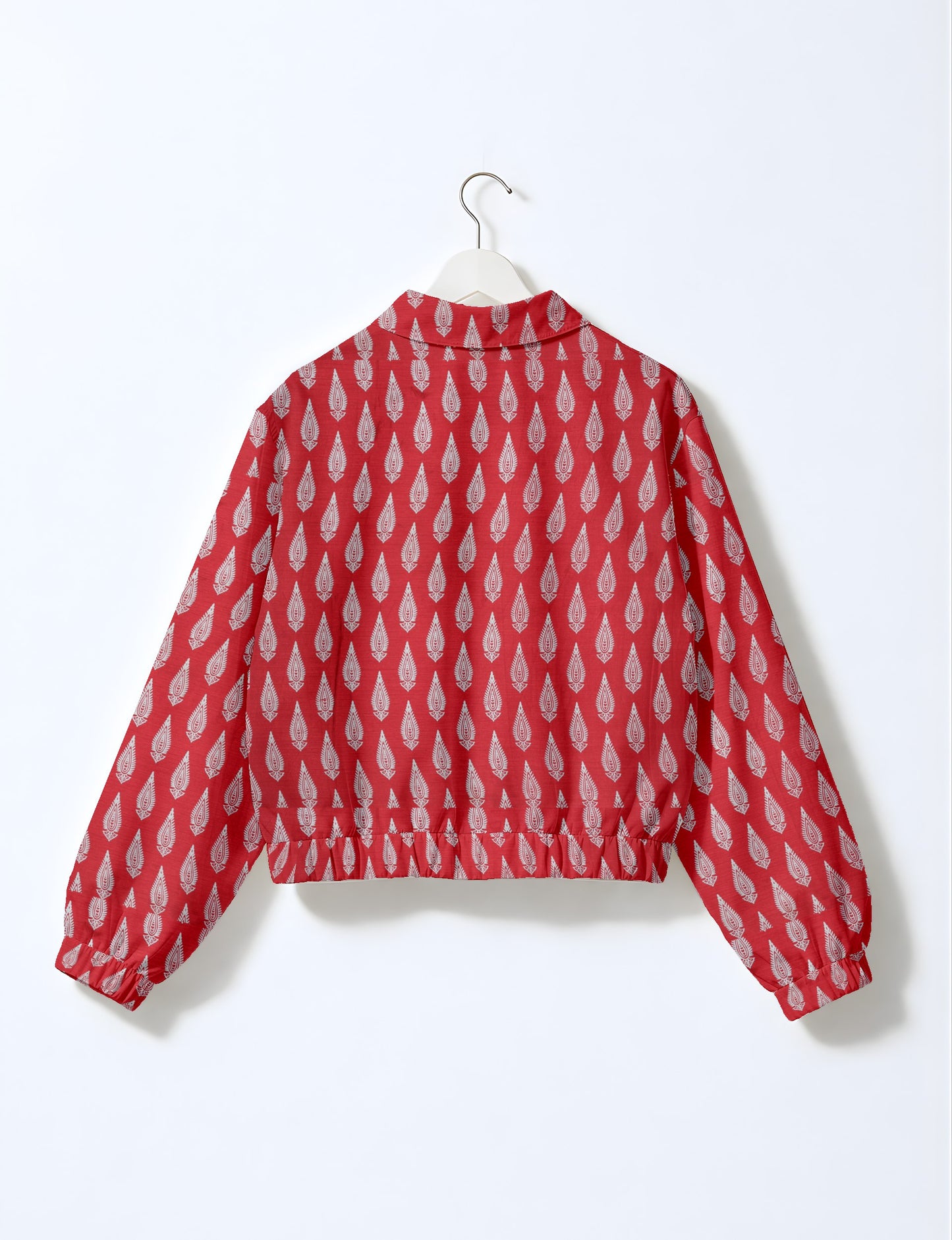 Upcycled Bomber Jacket made from recycled sari materials, featuring a cute cropped shape, elasticated hem and cuffs, and contrast sari print lining. Sustainable apparel promoting eco-friendly fashion and ethical clothing.