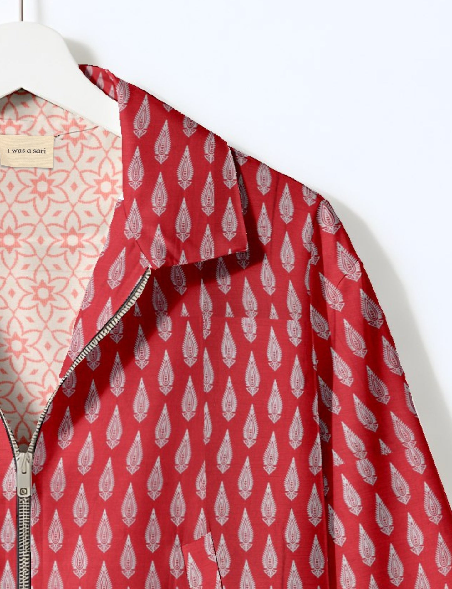 Upcycled Bomber Jacket made from recycled sari materials, featuring a cute cropped shape, elasticated hem and cuffs, and contrast sari print lining. Sustainable apparel promoting eco-friendly fashion and ethical clothing.