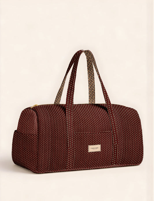 Quilted travel barrel bag with spacious interior and dual handles
Stylish quilted barrel handbag for daily use and short trips
Quilted barrel duffle-style bag with zip closure and inner pouch
I was a Sari quilted barrel bag front view showing structured shape
Quilted barrel bag side view highlighting size and handle drop
Open quilted barrel bag showing spacious interior and pouch