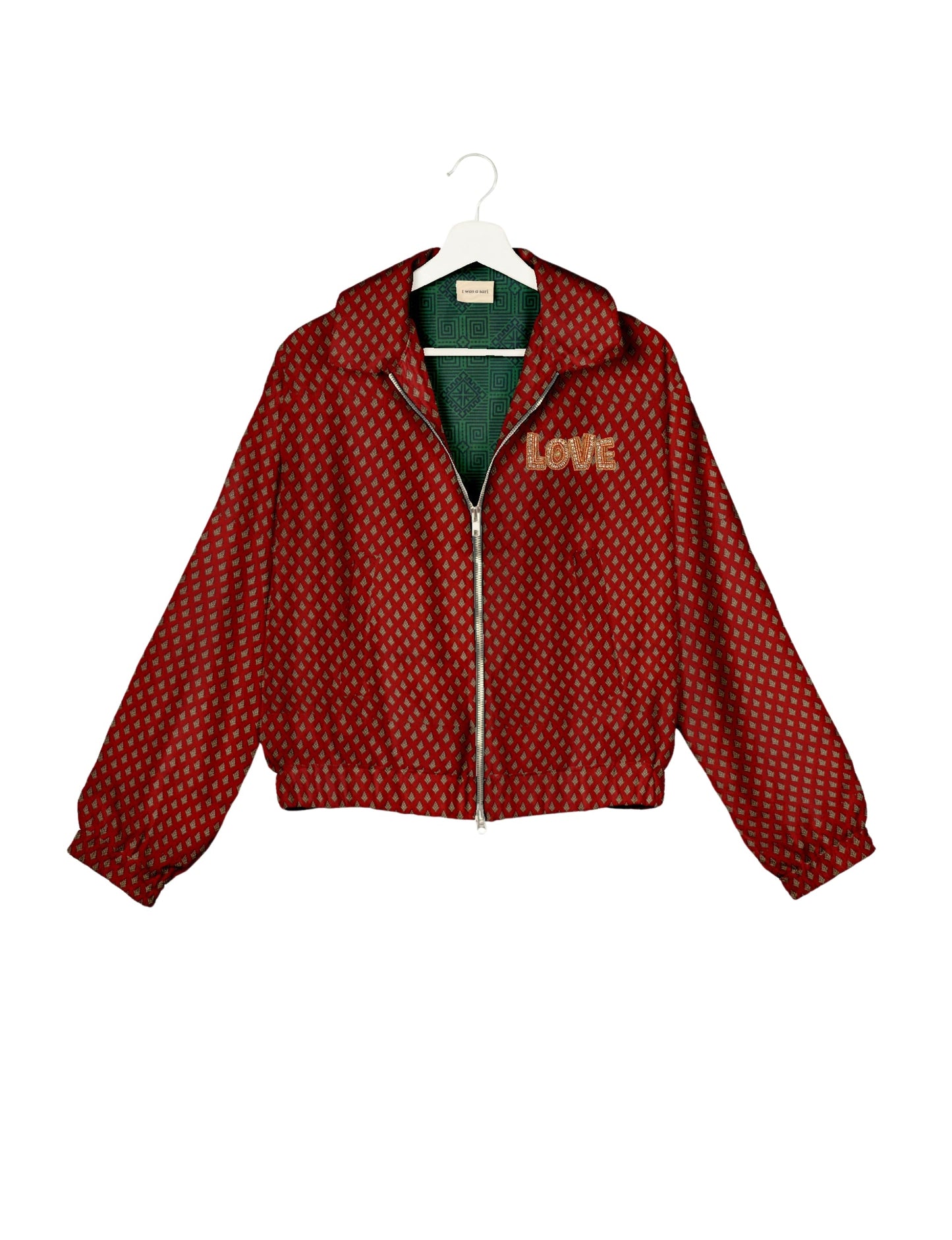 Love Bomber Jacket made from recycled fabric, featuring hand-stitched Aari embroidery. A unique piece of zero-waste clothing, part of the circular fashion movement. Designed with upcycled materials for a stylish yet environmentally friendly clothing choice.