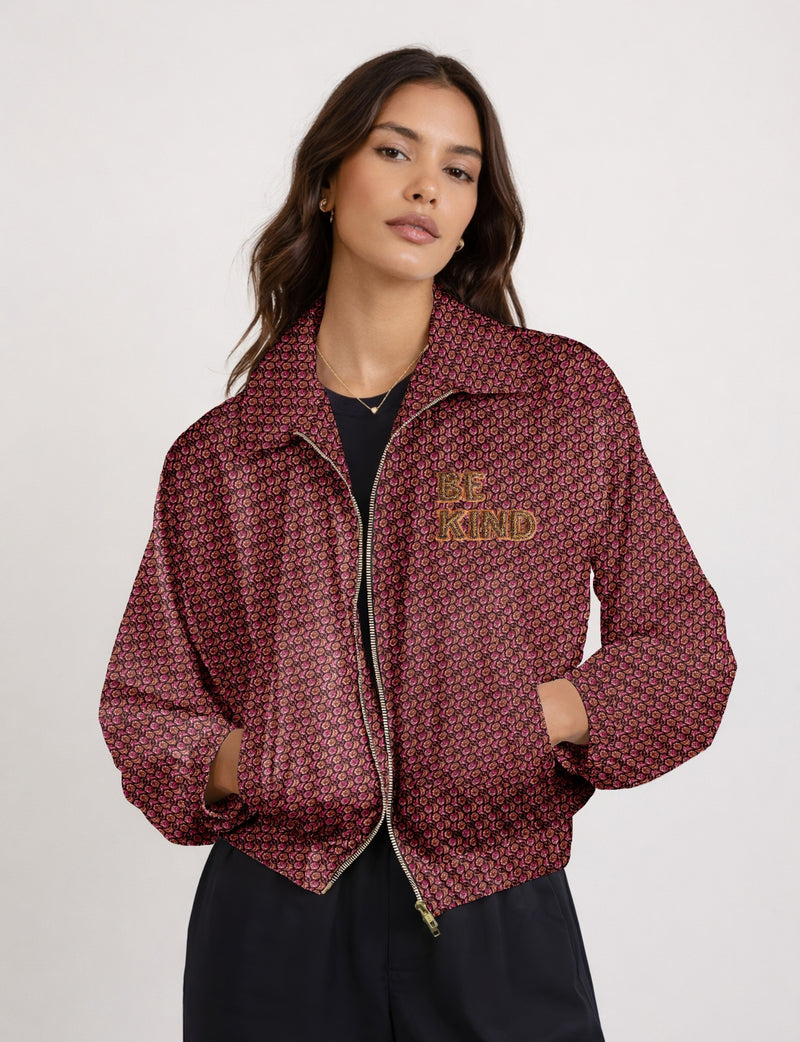 BE KIND Bomber jacket made from upcycled sari fabric with handcrafted Aari embroidery by female artisans.