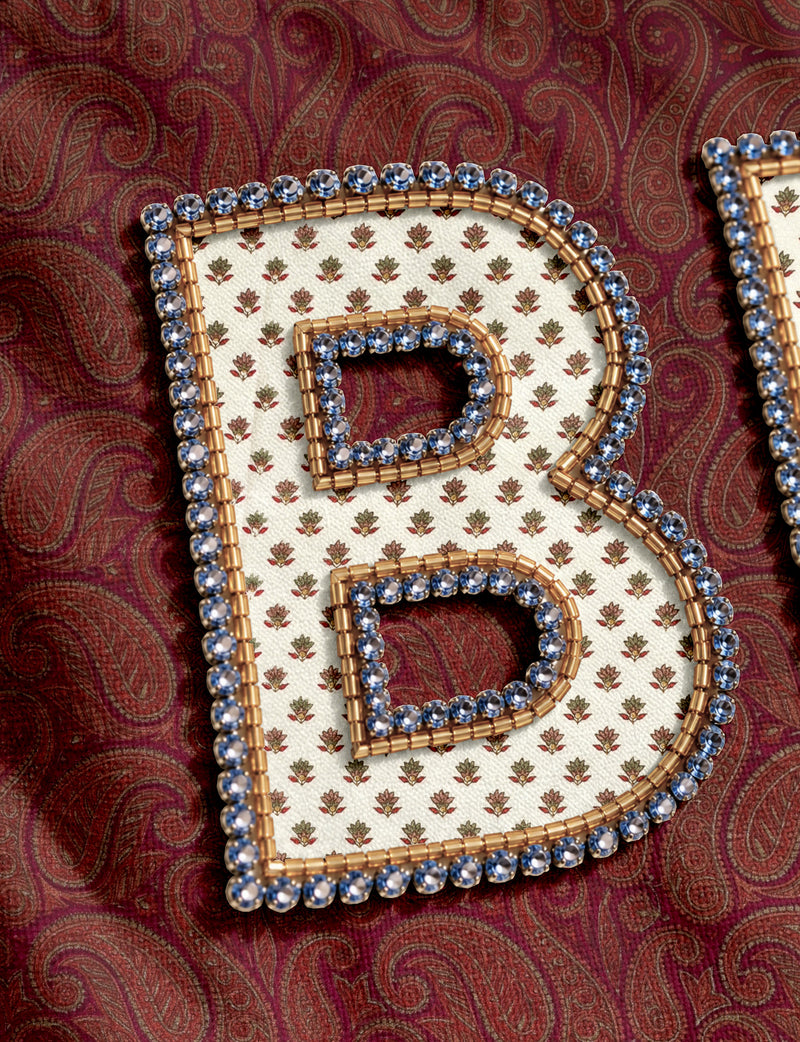 Be Kind tote bag with contrast sari fabric appliqué lettering, double shoulder straps, and front slip pocket.