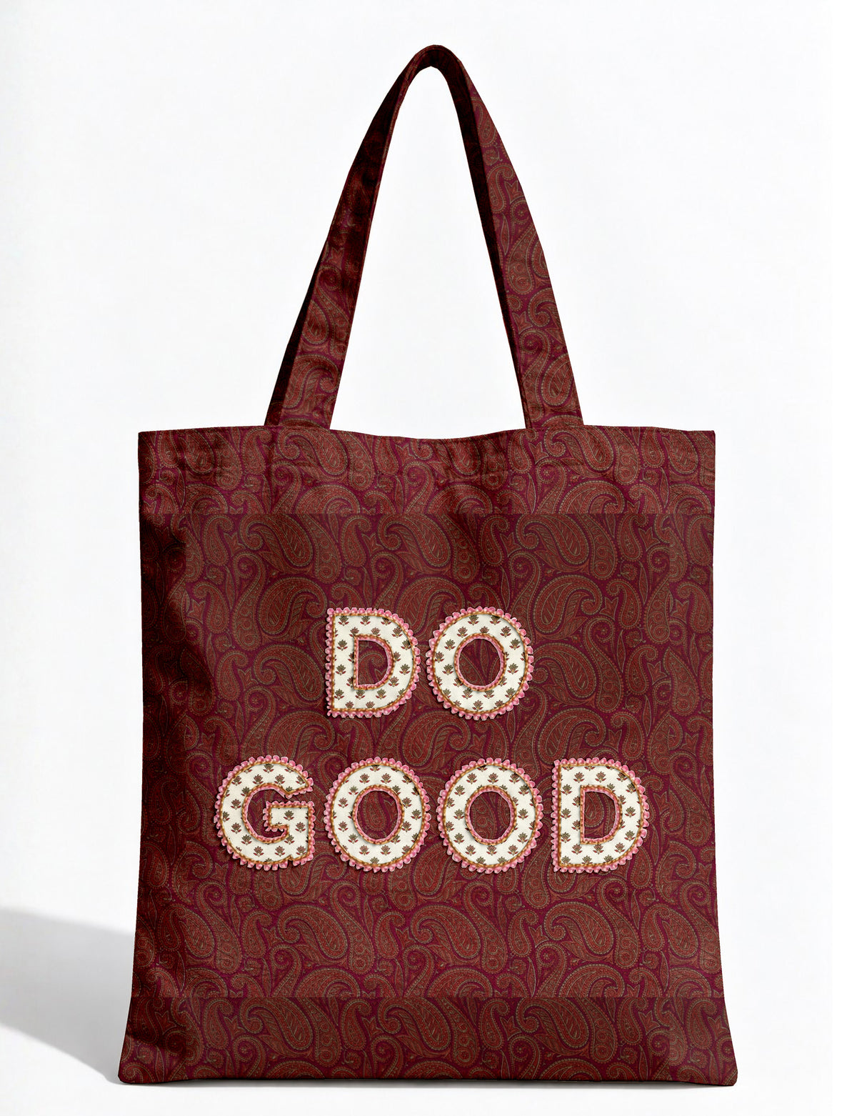 DO GOOD tote bag featuring contrasting sari fabric appliqué lettering, double shoulder straps, soft construction and an internal slip pocket with piping detail.
