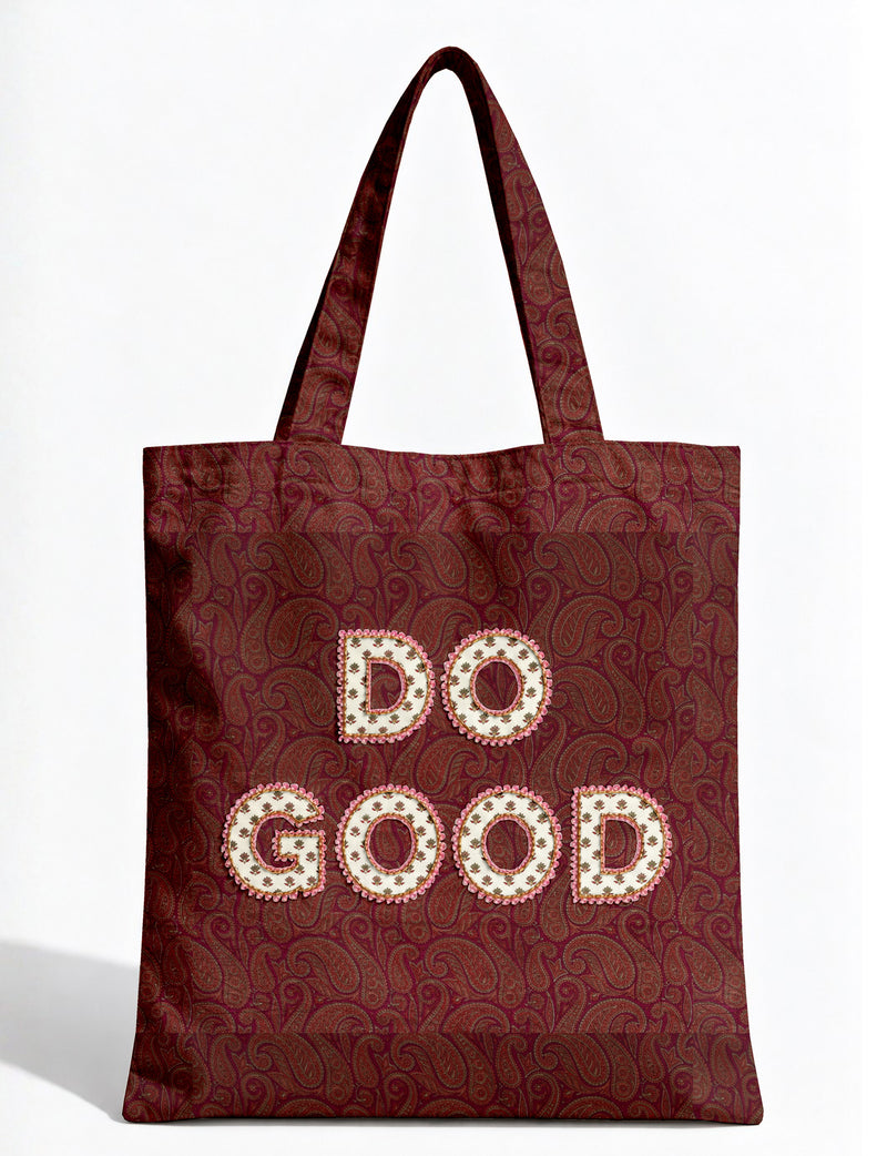 DO GOOD tote bag featuring contrasting sari fabric appliqué lettering, double shoulder straps, soft construction and an internal slip pocket with piping detail.