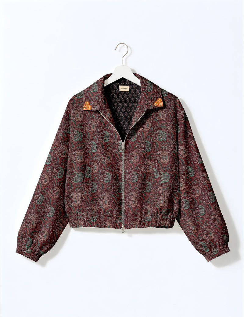 Love Bomber Jacket made from recycled fabric, featuring hand-stitched Aari embroidery. A unique piece of zero-waste clothing, part of the circular fashion movement. Designed with upcycled materials for a stylish yet environmentally friendly clothing choice.