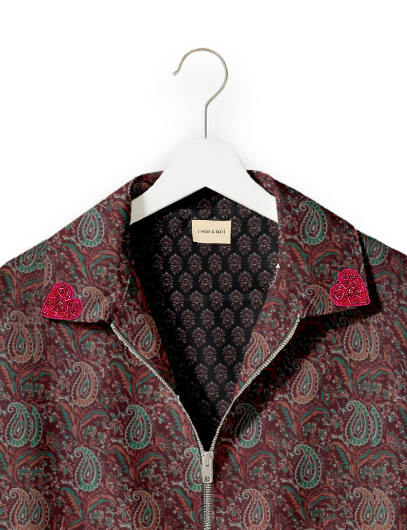 Love Bomber Jacket made from recycled fabric, featuring hand-stitched Aari embroidery. A unique piece of zero-waste clothing, part of the circular fashion movement. Designed with upcycled materials for a stylish yet environmentally friendly clothing choice.