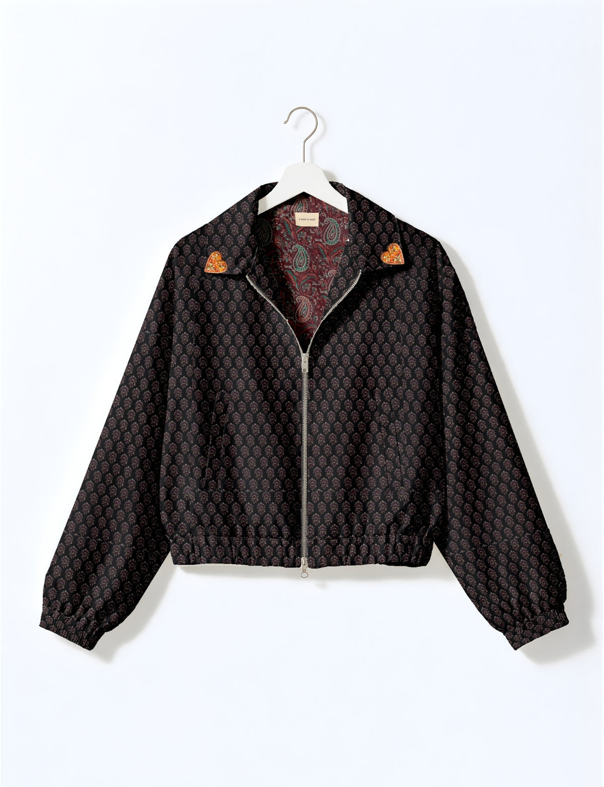Love Bomber Jacket made from recycled fabric, featuring hand-stitched Aari embroidery. A unique piece of zero-waste clothing, part of the circular fashion movement. Designed with upcycled materials for a stylish yet environmentally friendly clothing choice.