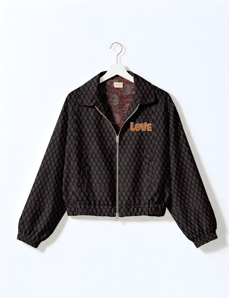 Love Bomber Jacket made from recycled fabric, featuring hand-stitched Aari embroidery. A unique piece of zero-waste clothing, part of the circular fashion movement. Designed with upcycled materials for a stylish yet environmentally friendly clothing choice.
