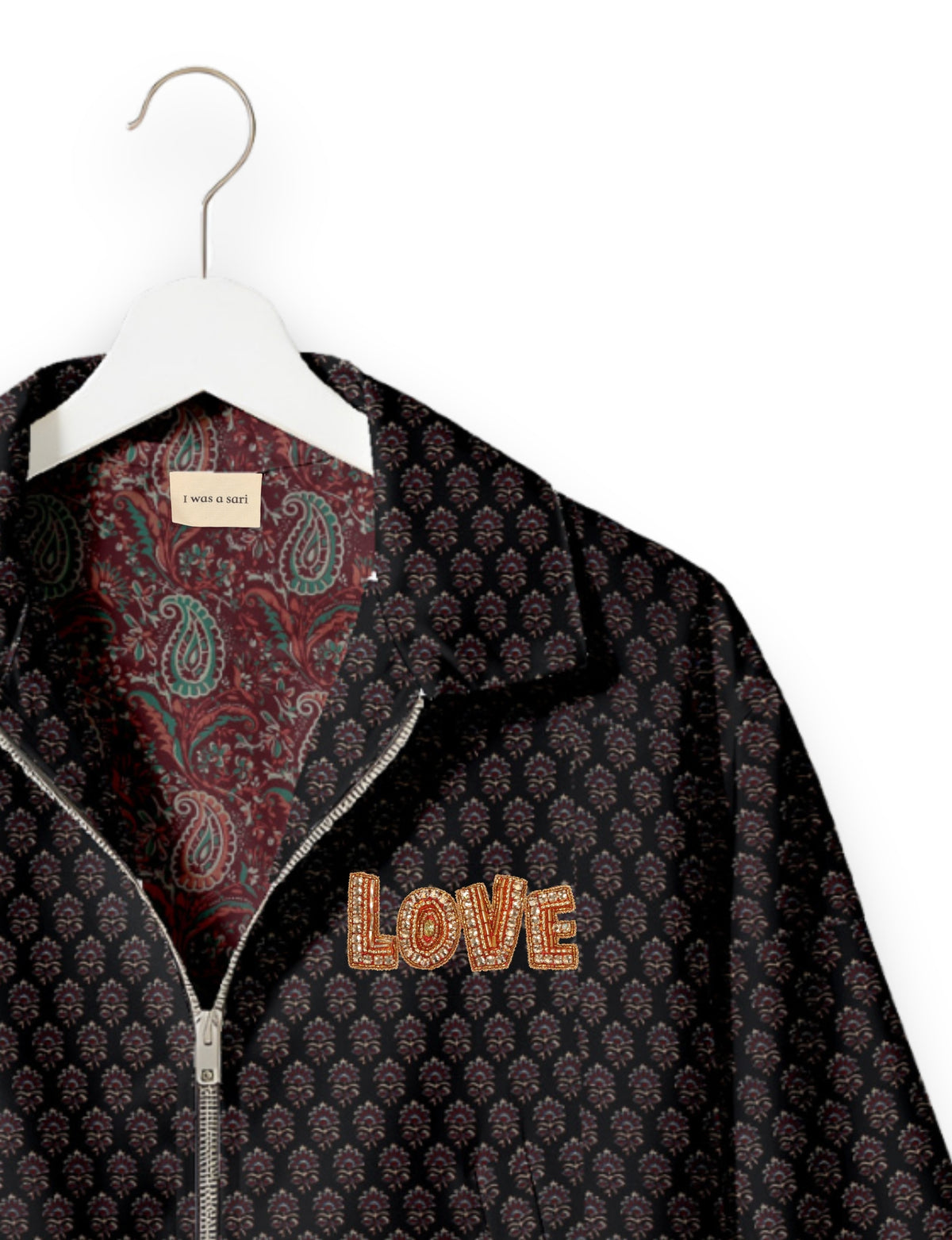Love Bomber Jacket made from recycled fabric, featuring hand-stitched Aari embroidery. A unique piece of zero-waste clothing, part of the circular fashion movement. Designed with upcycled materials for a stylish yet environmentally friendly clothing choice.