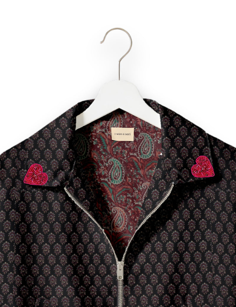 Love Bomber Jacket made from recycled fabric, featuring hand-stitched Aari embroidery. A unique piece of zero-waste clothing, part of the circular fashion movement. Designed with upcycled materials for a stylish yet environmentally friendly clothing choice.