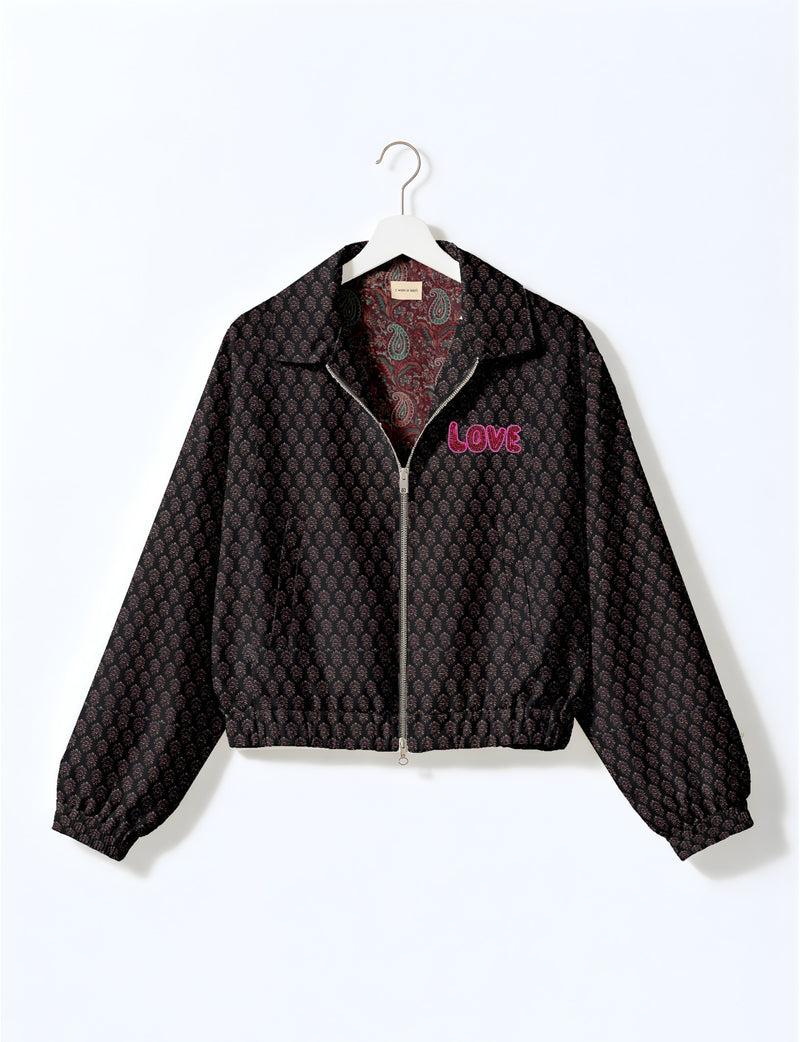 Love Bomber Jacket made from recycled fabric, featuring hand-stitched Aari embroidery. A unique piece of zero-waste clothing, part of the circular fashion movement. Designed with upcycled materials for a stylish yet environmentally friendly clothing choice.