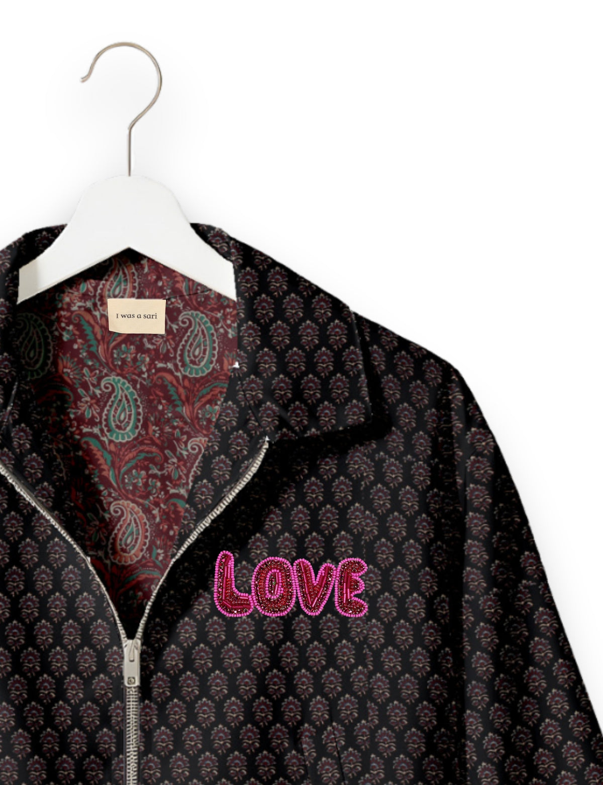 Love Bomber Jacket made from recycled fabric, featuring hand-stitched Aari embroidery. A unique piece of zero-waste clothing, part of the circular fashion movement. Designed with upcycled materials for a stylish yet environmentally friendly clothing choice.