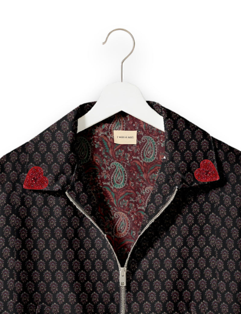 Love Bomber Jacket made from recycled fabric, featuring hand-stitched Aari embroidery. A unique piece of zero-waste clothing, part of the circular fashion movement. Designed with upcycled materials for a stylish yet environmentally friendly clothing choice.