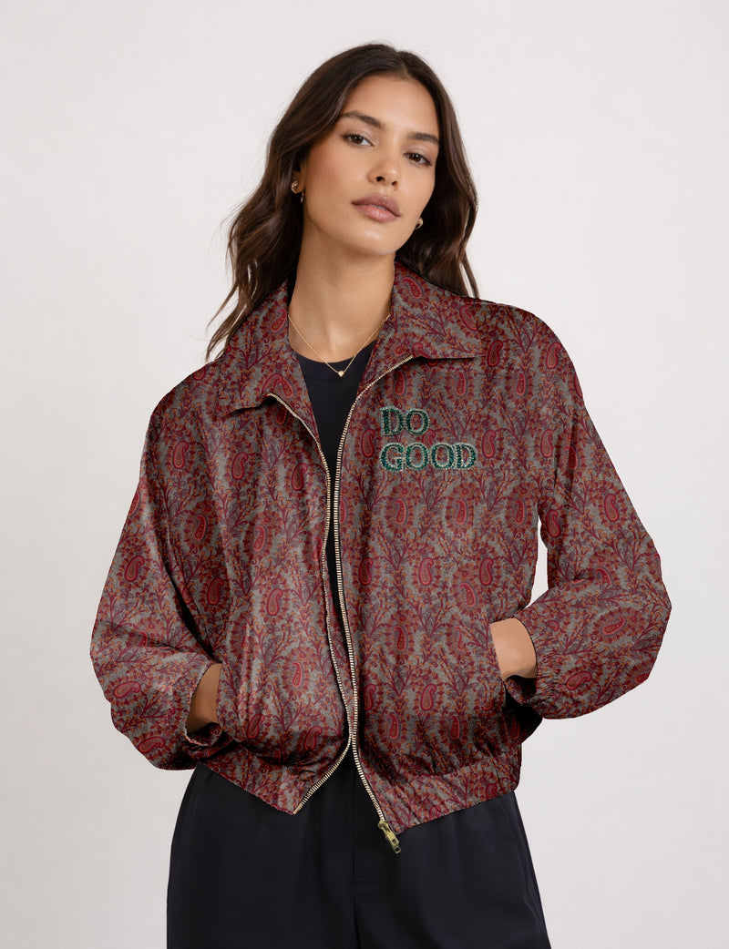Green cropped bomber jacket with DO GOOD hand embroidery on the left chest and contrasting inner.