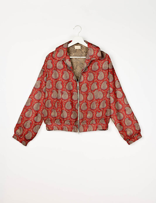 Stylish BOMBER JACKET, an upcycled clothing masterpiece with a cute cropped shape, elasticated details, and detachable metallic zipper. Contrast sari print lining adds a unique touch. Explore sustainable and eco-friendly fashion.