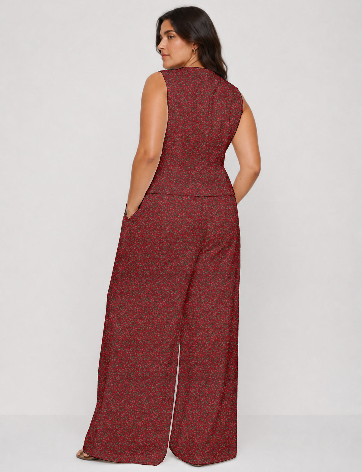 Women's tailored waistcoat set with a sleeveless V-neck button-front waistcoat and high-rise wide leg trousers in a coordinated matching outfit.